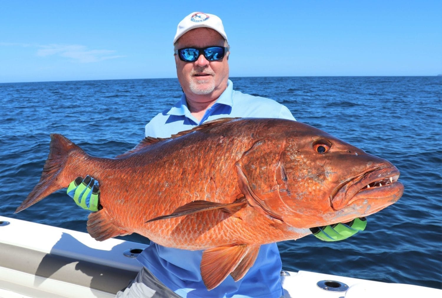 An angler with a cubera snapper