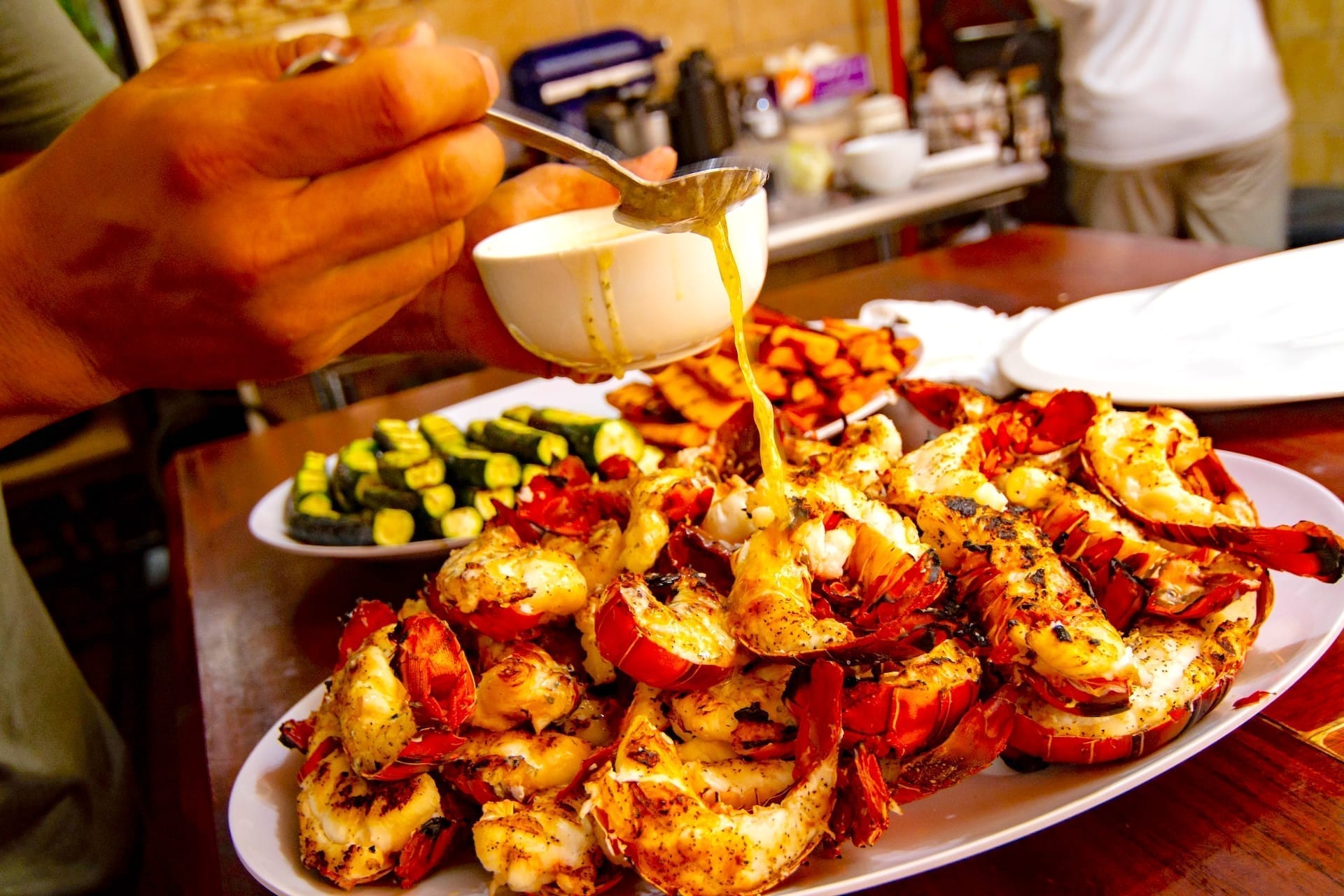 A chef plating a dish at the lodge