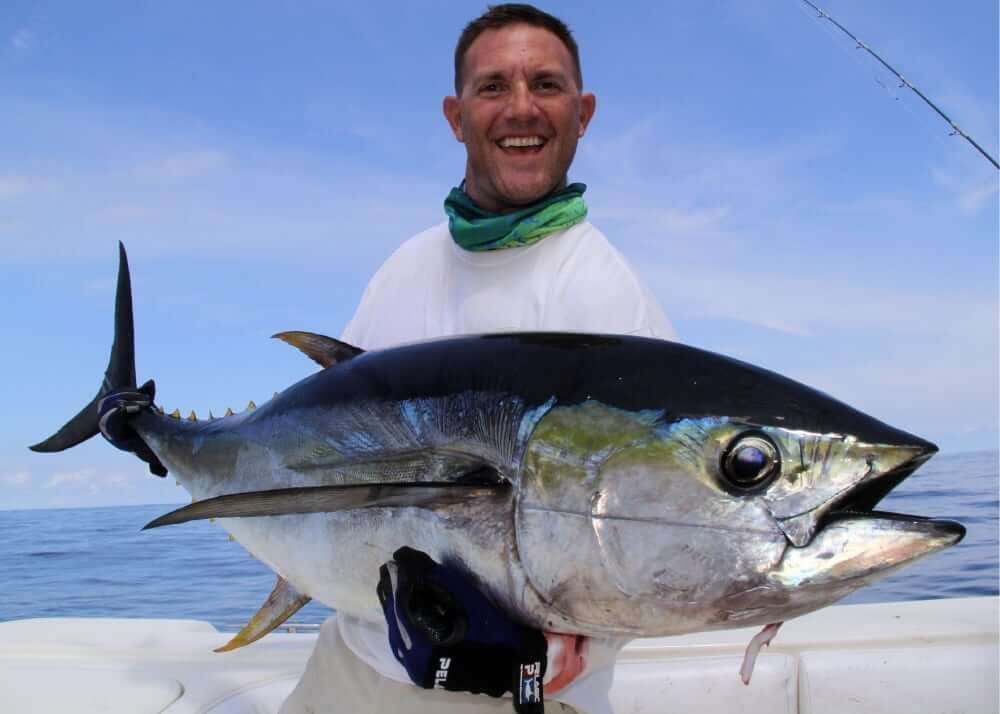 Captain Shane with a cow yellowfin