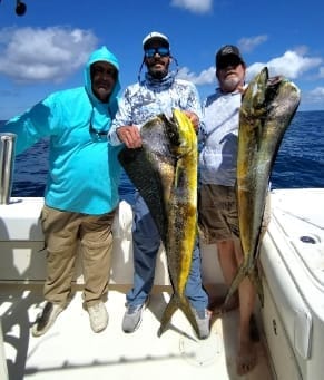 Anglers dressed for sun protection on a Panama fishing trip